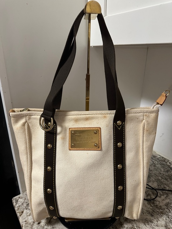 Louis Vuitton Handbags - Louis Vuitton Cream Canvas Tote with Dark Brown Straps and Gold Plaque PRE-OWNED